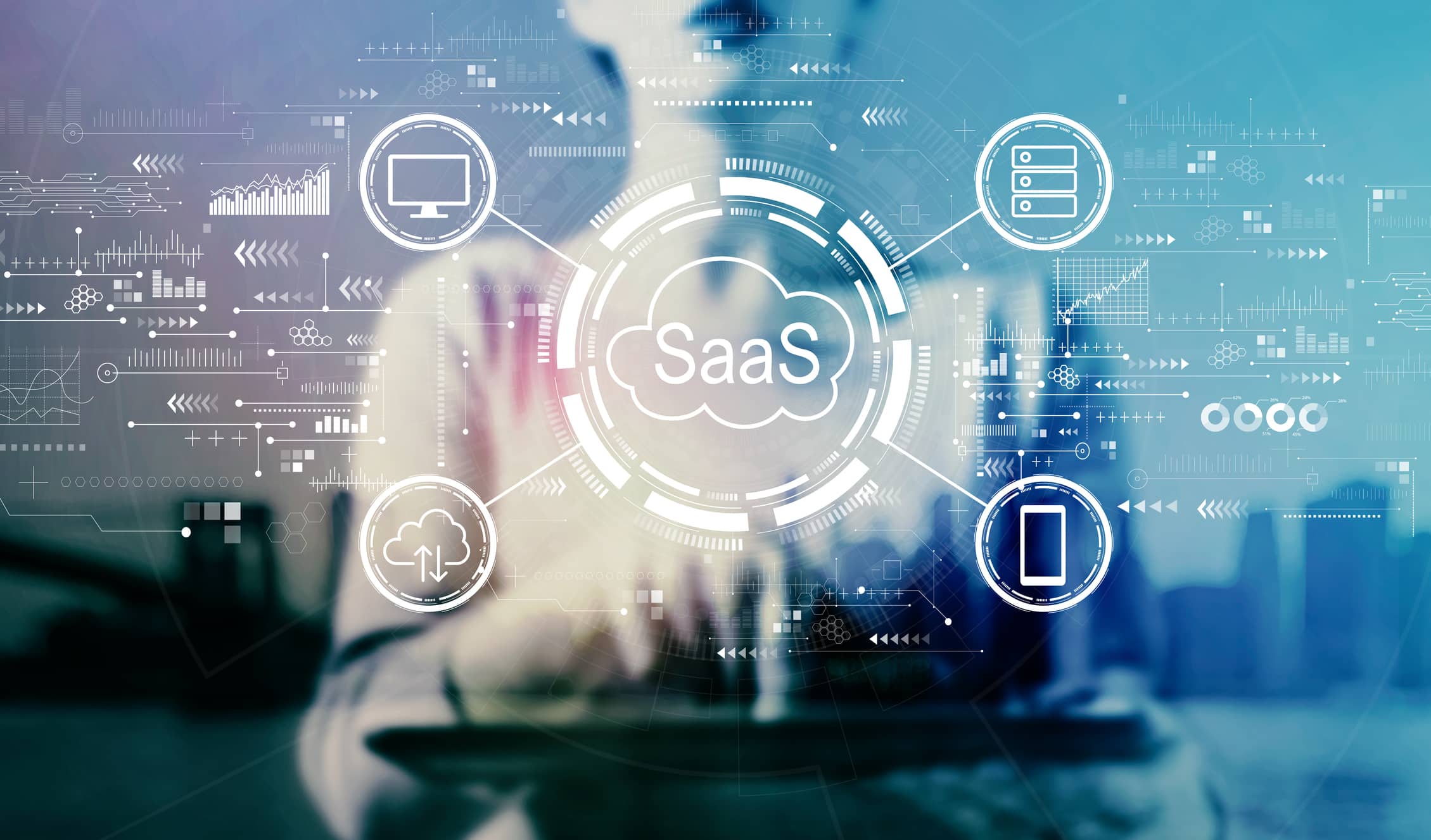 SaaS – software as a service concept with businesswoman using a tablet